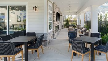 Covered outdoor pavilion with lounge, fireplace and tv